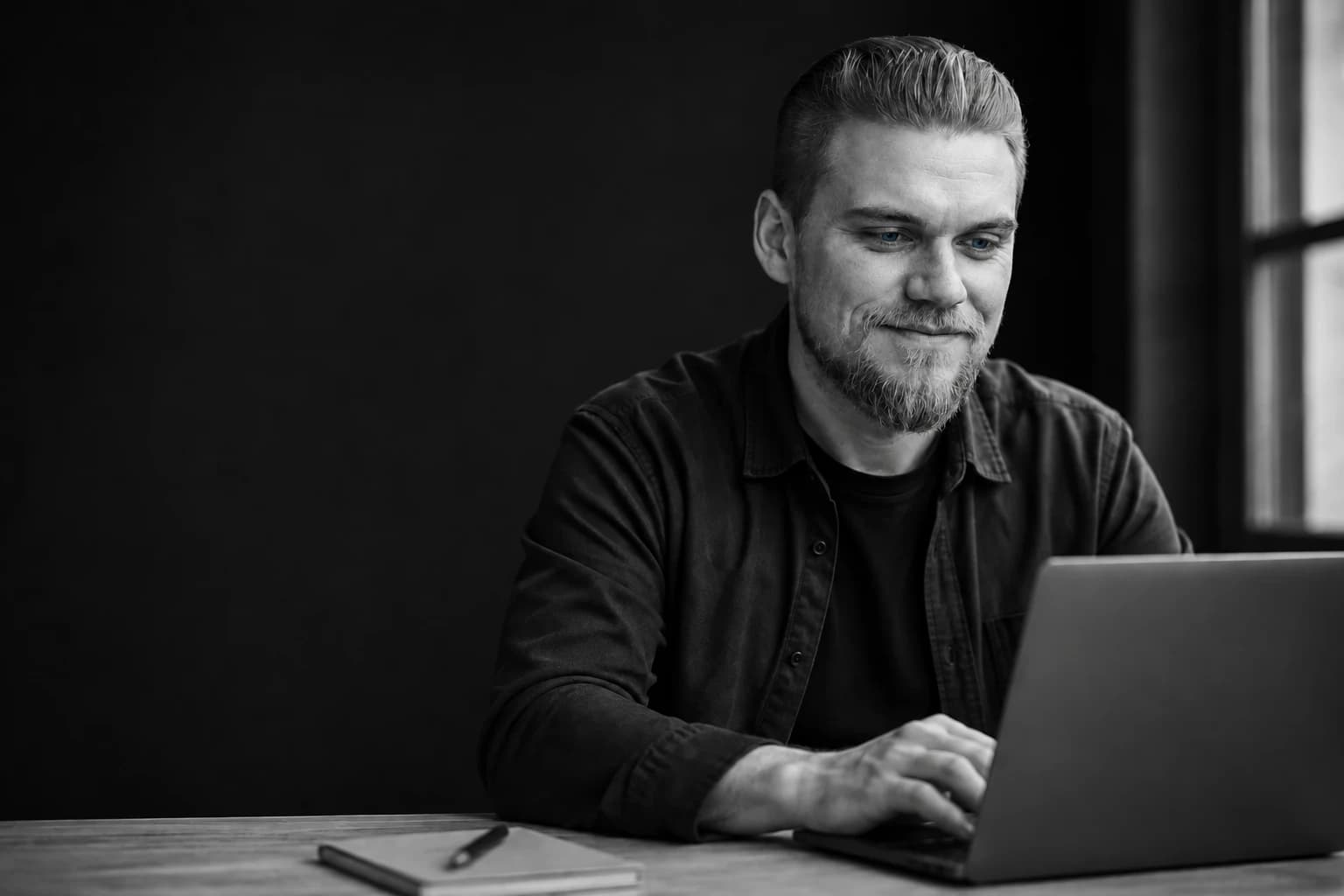 AI-generated portrait of Felix working at a laptop